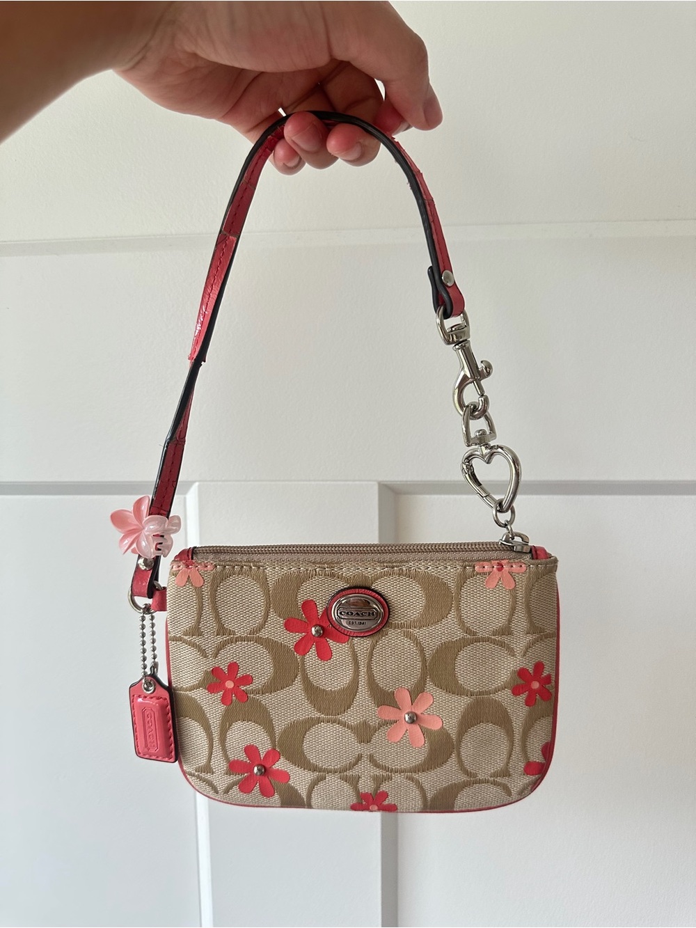 Coach Beige Signature Canvas Wristlet with Pink Floral Accents